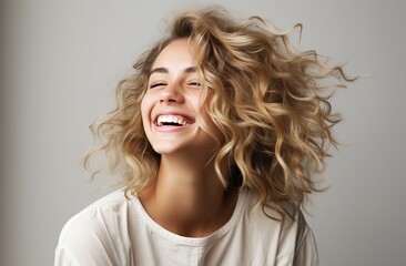 a young blonde woman is laughing, - Powered by Adobe