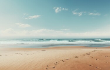 Fototapeta na wymiar an empty beach with an open ocean in background,