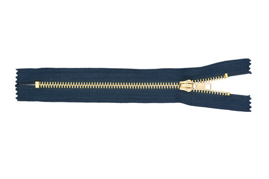 Dark blue metal zipper isolated on white. Cutout zipper object. Vintage style clothing accessories. Sewer element background. Fastener isolated. Golden yellow shiny zipper teeth background.