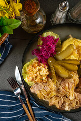 Pork tenderloin stewed in onions.