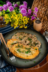 Crispy potato pancakes with mushroom sauce