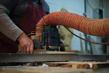 Craftsmanship on display at saw. Connects the importance of sustainable practices in carpentry.
