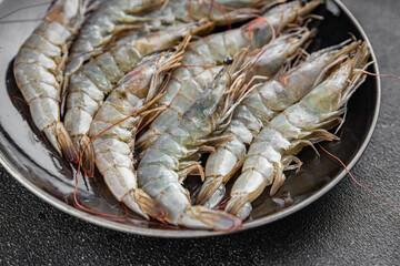 shrimp fresh langoustine raw prawn seafood fresh eating cooking appetizer meal food snack on the...