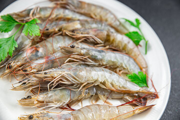 shrimp fresh langoustine raw prawn seafood fresh eating cooking appetizer meal food snack on the table copy space food background rustic top view 