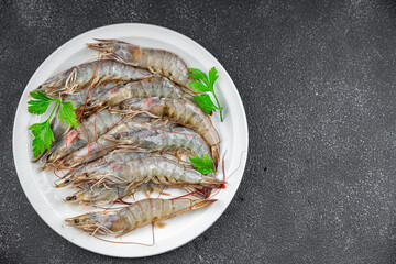 shrimp fresh langoustine raw prawn seafood fresh eating cooking appetizer meal food snack on the table copy space food background rustic top view 