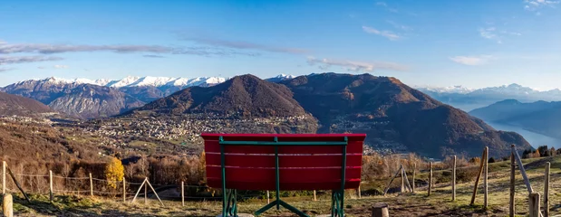 Foto auf Acrylglas Big red bench on the alps of Lake Como © Nikokvfrmoto