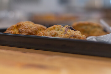 Fresh pastries on display, morning breakfast sweet food background, copy space image