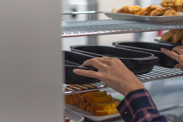 Fresh pastries on display, morning breakfast sweet food background, copy space image