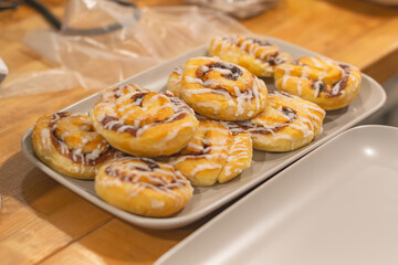 Fresh pastries on display, morning breakfast sweet food background, copy space image