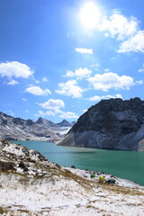 Obraz premium Ala-köl mountain lake with fresh snow during summer in Tian Shan mountains, Karakol, Kyrgyzstan