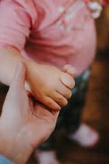 hands of parent and child
