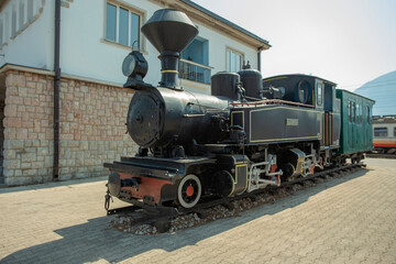 Fototapeta na wymiar old locomotive at railway station Podgorica