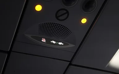 Fotobehang Aviation safety rules. Close up photo with safety light signs inside and airplane like no usage of electronics during take-of, seat belt and no smoking. Travel by plane. © Dragoș Asaftei