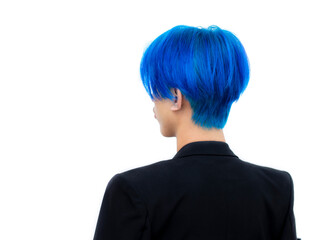 Portrait of a man with bright colored flying hair, all shades of blue. Hair coloring.Hair fluttering in the wind. Teen age with short hair. Professional coloring.