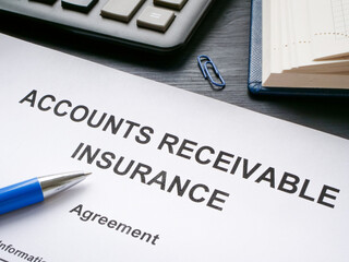 Accounts receivable insurance agreement and pen.