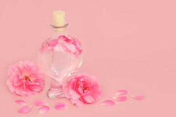 Rose Flower Perfume in Heart Shaped Bottle with Pink Roses