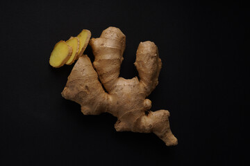 ginger root, close-up, dark background, no people
