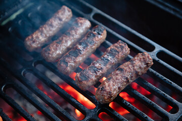Cevapchichi is a type of kebab, a sausage made from ground meat with onions and spices, which is cooked on the grill.