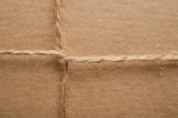 Top view of a craft gift box tied with twine, zero waste gift packaging close-up