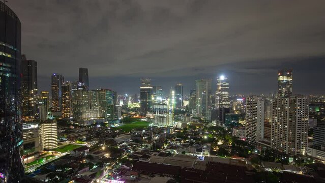 night time illumination jakarta downtown cityscape rooftop panorama 4k timelapse indonesia
