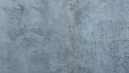 A blue gray grunge picturesque wall texture with stains and scratches on concrete surface 