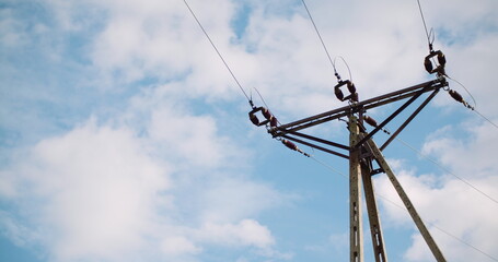 Energy pole against beautiful cloudscape