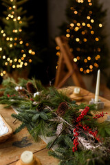 christmas table with candles and christmas decorations
