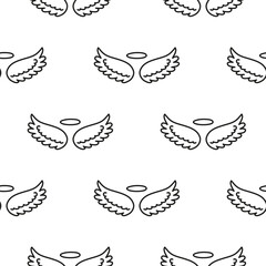 Seamless pattern with angel wings and nimbus.