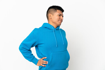 Young Ecuadorian man isolated on white background suffering from backache for having made an effort