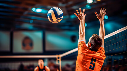 Male volleyball player reaching for ball with hands - obrazy, fototapety, plakaty