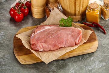 Raw pork schnitzel for cooking