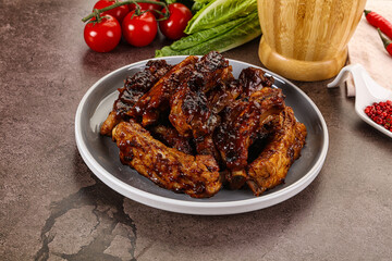 Grilled pork ribs in barbecue sauce