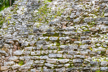 Coba Maya Ruins ancient buildings pyramids in tropical jungle Mexico.
