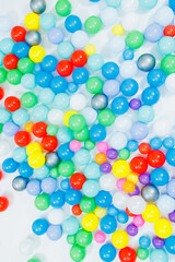 Plastic multi-colored balls for children's games. Balls for a dry pool.