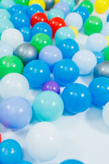 Plastic multi-colored balls for children's games. Balls for a dry pool.