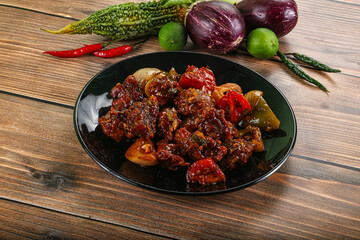Asian cuisine - pork with chili sauce