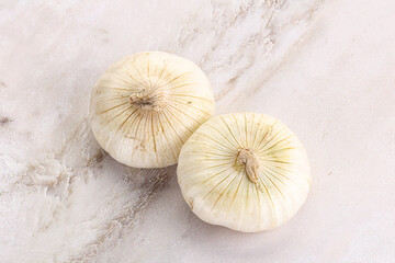 Raw white onion heap isolated