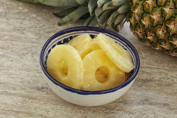 Marinated pineapple rings in the bowl