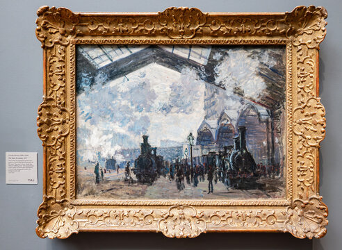 London, UK - May 19, 2023: The Gare St-Lazare by Claude Monet. This painting is one of a dozen views of the Gare Saint-Lazare that Monet painted in early 1877.  Exposed at National Gallery of London
