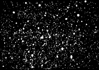 Black background with flying white particles.