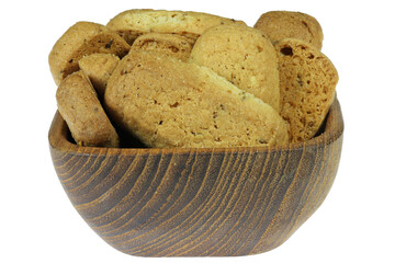 Fryske Dumkes (Frisian Thumbs) in a wooden bowl isolated on white background