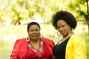 Two Middle Aged African American Women Outdoor Portrait
