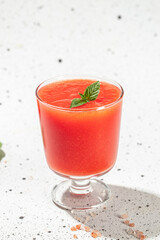 tomato juice with basil leaves. Concept healthy and balanced eating. vertical image. top view. copy space for text