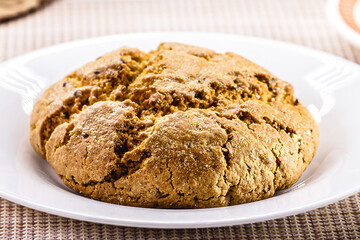 broa, is a type of corn and wheat bread traditionally made in Portugal and Brazil. It is made with a mixture of corn, wheat or cornmeal flour.