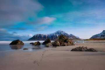Skagsanden beach on Lofoten Islands, Norway. Aurora Borealis. Stars and northern light. Night landscape. Long exposure shot. Nature image