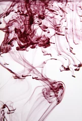  Ink blot and watercolor pour flow color blot in water background. © Liliia