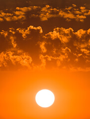 The sky with red sunrise. Vertical photo.