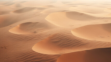 Fototapeta na wymiar Aerial View of Rolling Sand Dunes Background