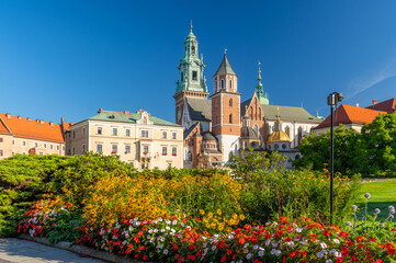 Summer view of Wawel cathedral and Wawel castle with blooming flowers on the Wawel Hill, Krakow, Poland