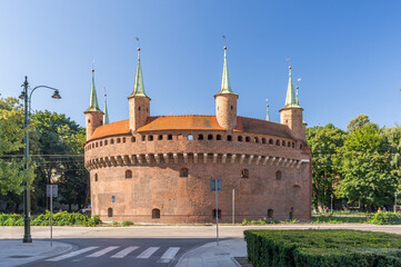 Gothic brick barbicane, part of the medieval city fortifications, Krakow, Poland - 688192723